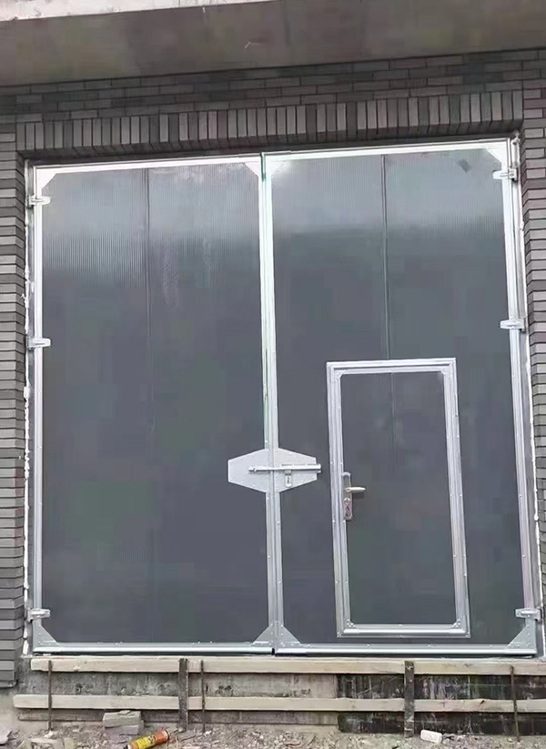 漳县工业平开门在大型设备制造车间的应用实例